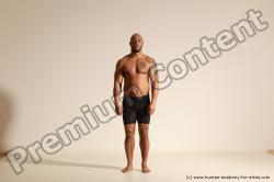 Underwear Gymnastic poses Man Black Muscular Bald Dancing Dynamic poses Academic